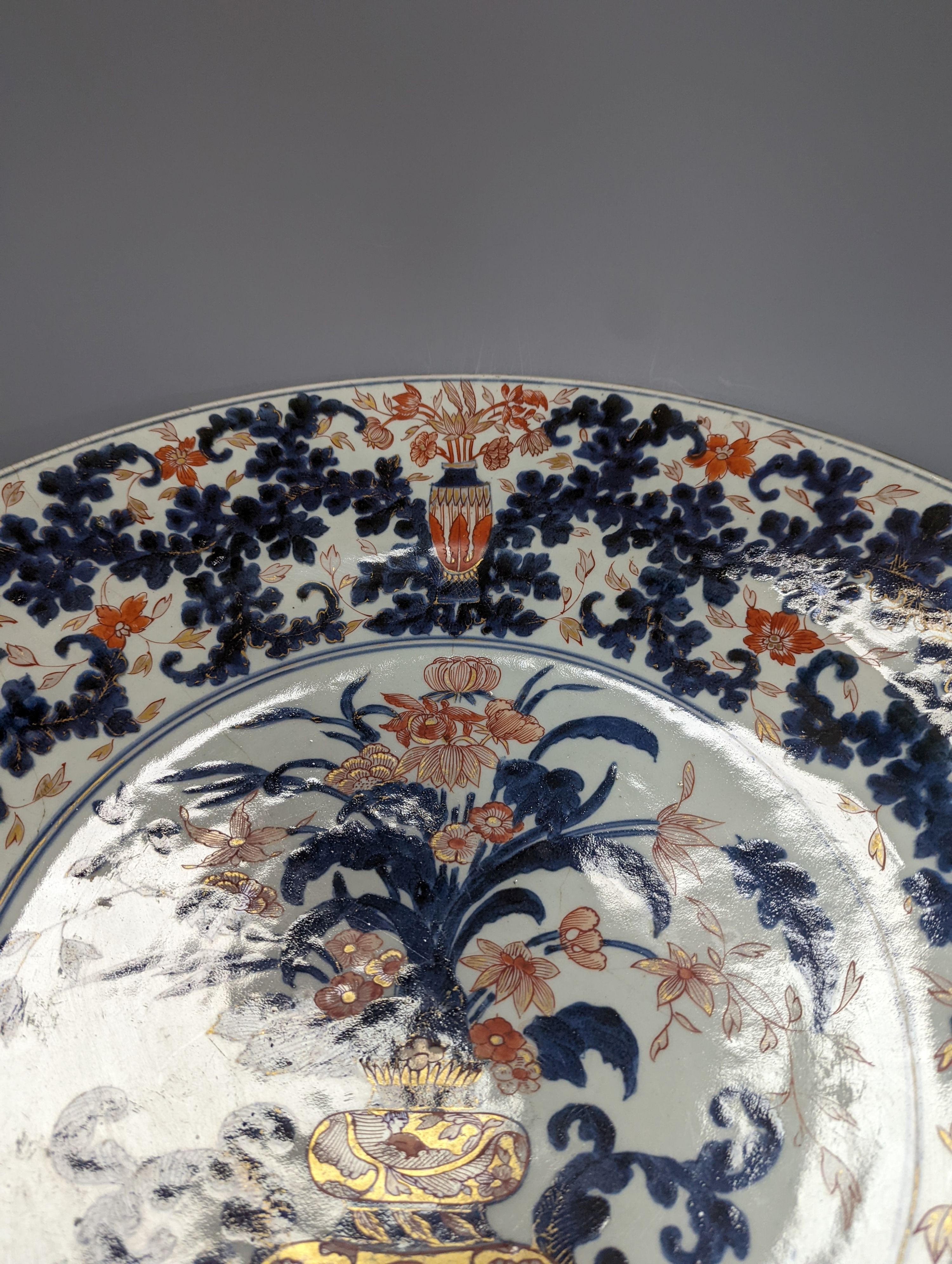 A large 17th/18th century Japanese Arita Imari palette charger, 55cm